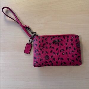 Coach wristlet. Pink with floral design.